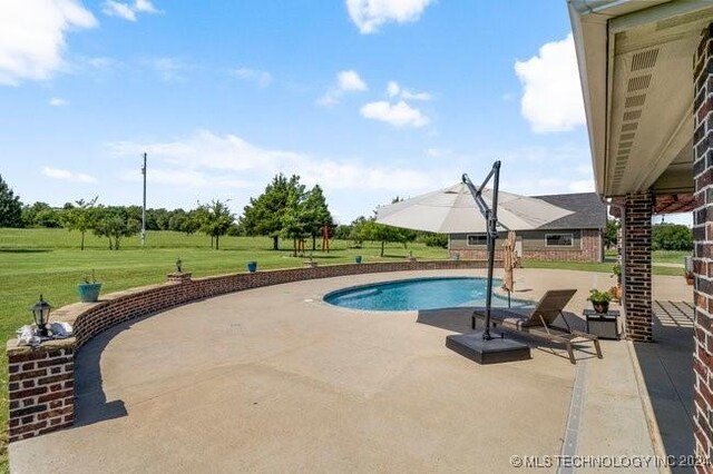 3526 Evans Ave, Mannford, OK 74044 - view of pool with a patio area and a lawn