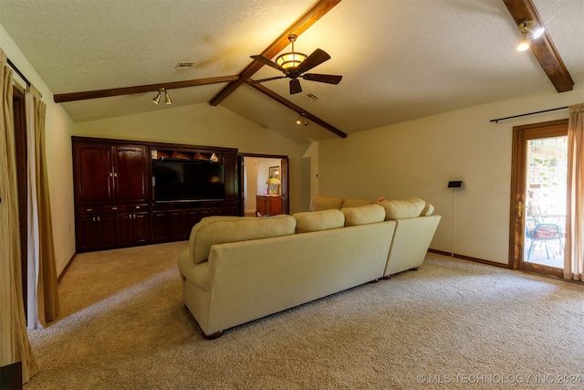 carpeted living room with vaulted ceiling with beams, ceiling fan, and a textured ceiling