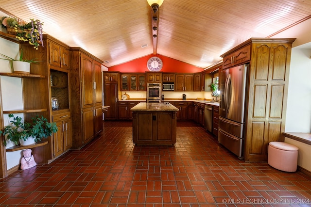 kitchen featuring appliances with stainless steel finishes, a kitchen island, wooden ceiling, lofted ceiling, and sink