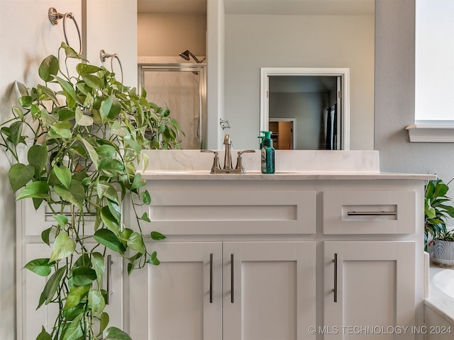 bathroom with vanity and plus walk in shower