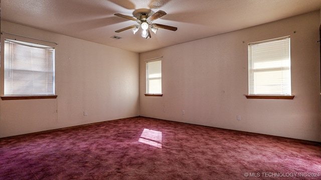 unfurnished room featuring carpet flooring and ceiling fan