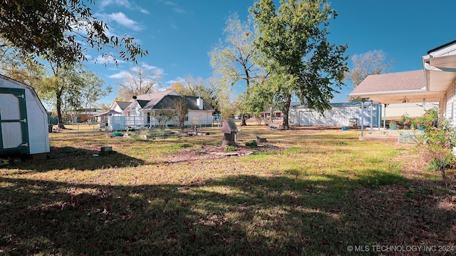 view of yard with a storage shed