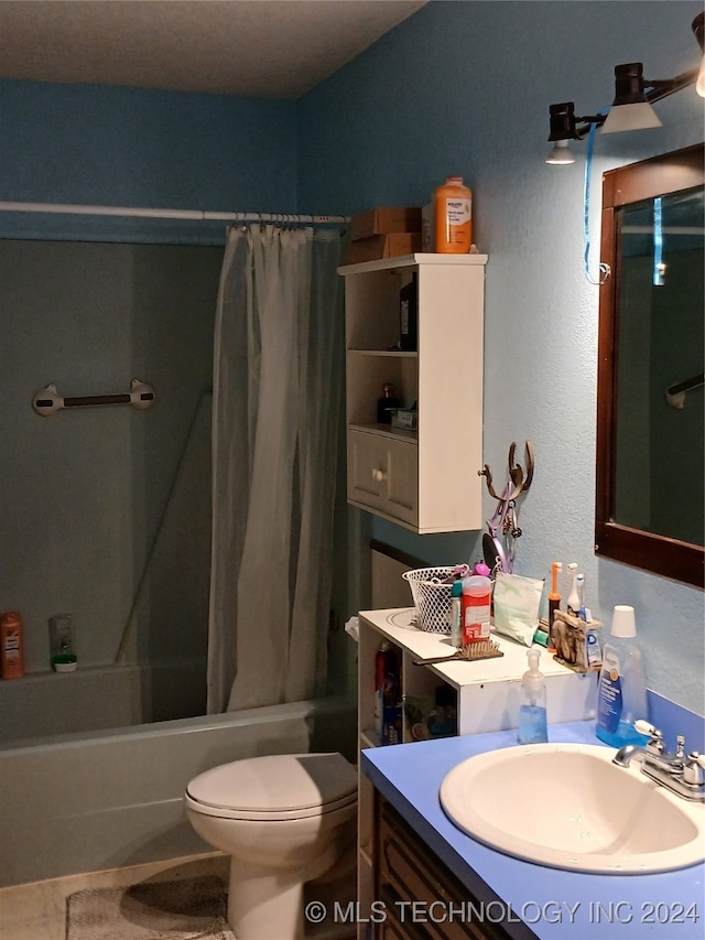 full bathroom featuring vanity, toilet, and shower / tub combo