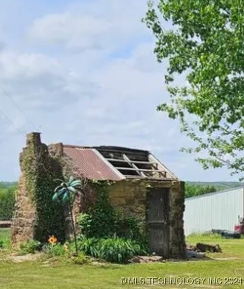 view of home's exterior featuring a yard