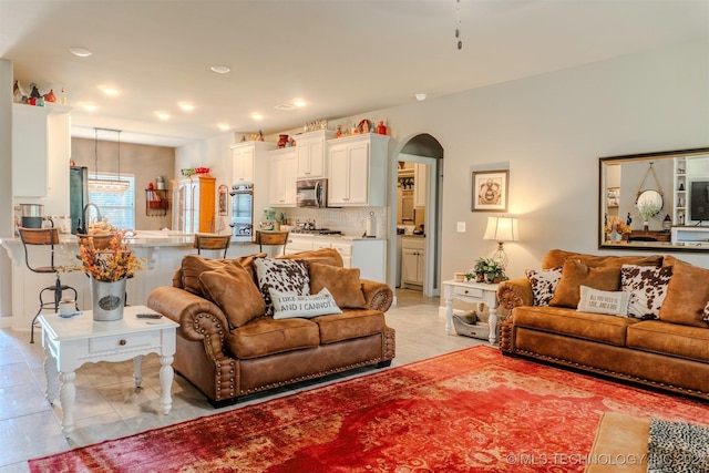 living room featuring light tile patterned floors