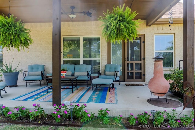 view of patio featuring an outdoor hangout area and ceiling fan