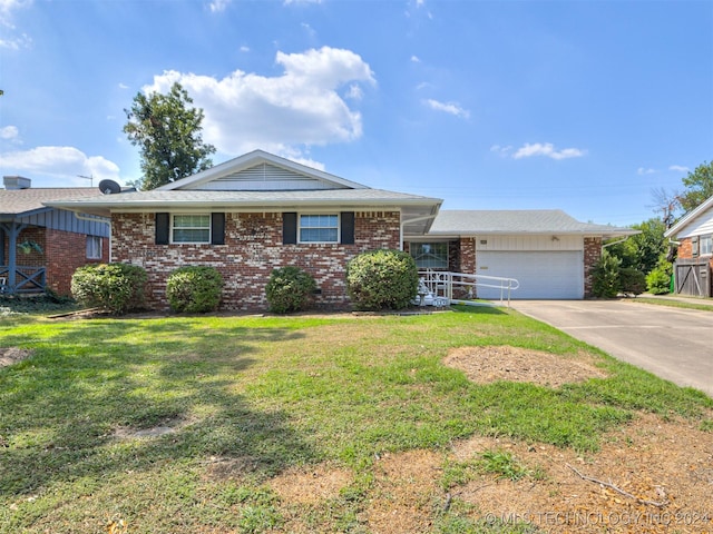 ranch-style house with a front yard and a garage