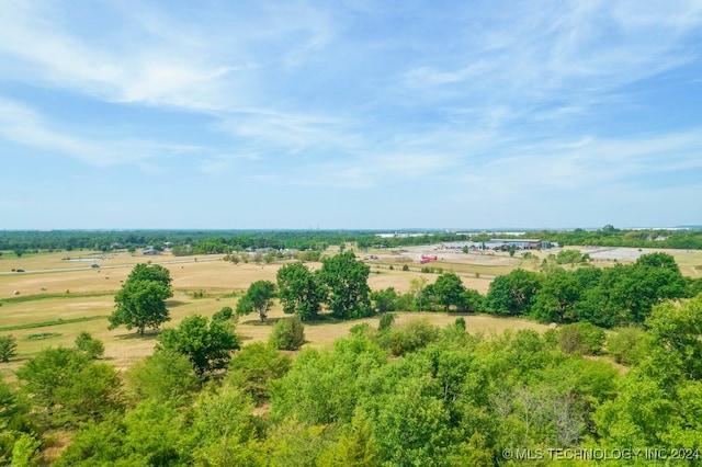 birds eye view of property with a rural view