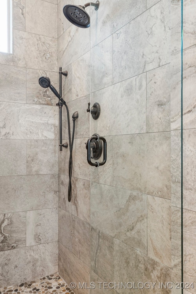 room details with a tile shower