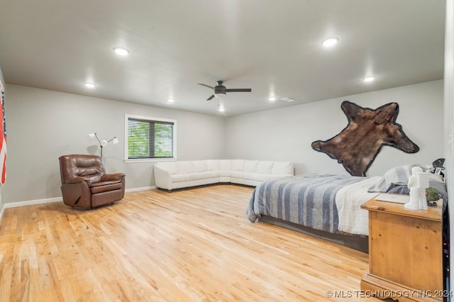 bedroom featuring ceiling fan and light wood-type flooring