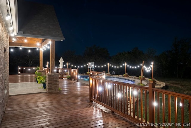 view of deck at twilight