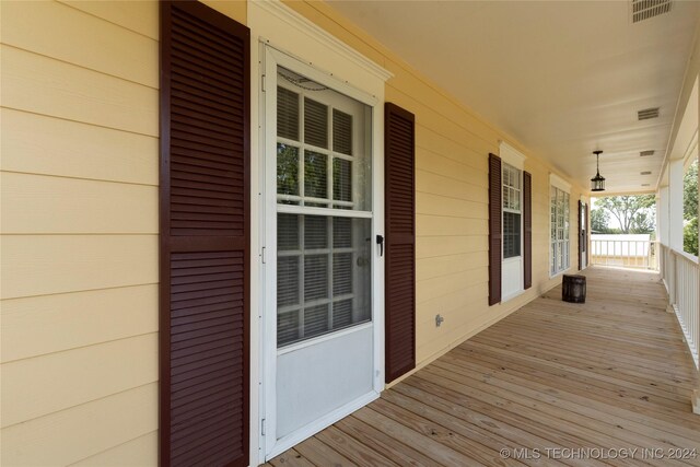 deck featuring covered porch