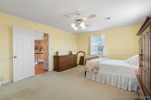 bedroom featuring ceiling fan and light colored carpet