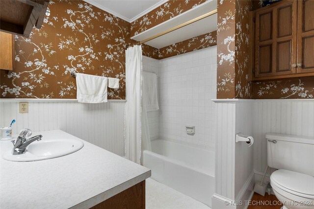 full bathroom with vanity, toilet, and shower / tub combo with curtain