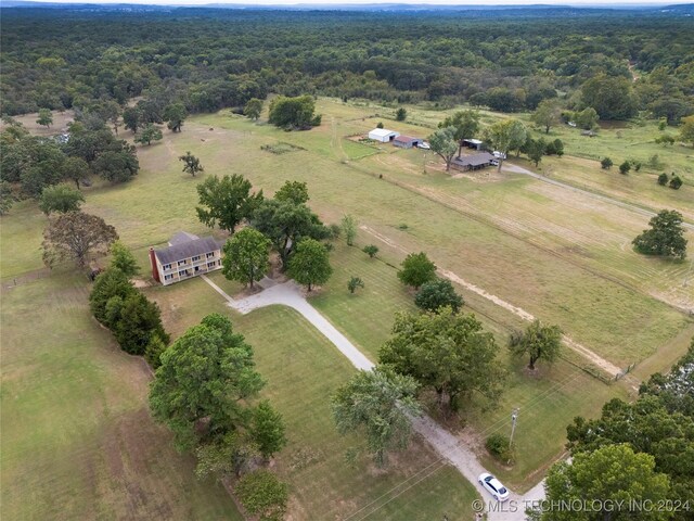 birds eye view of property featuring a rural view