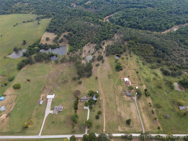 bird's eye view featuring a rural view and a water view