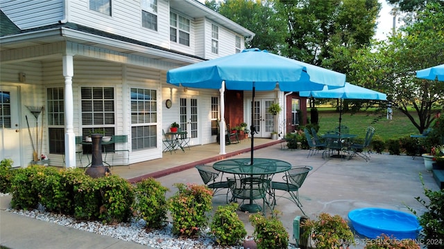 view of patio / terrace featuring french doors