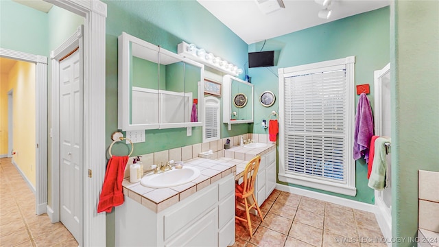 bathroom featuring tile patterned floors and vanity