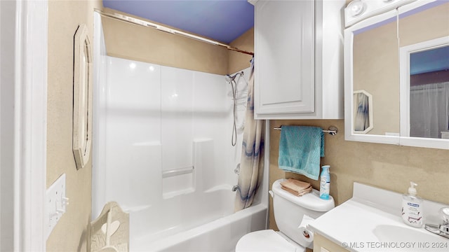 full bathroom featuring vanity, toilet, and shower / bathtub combination