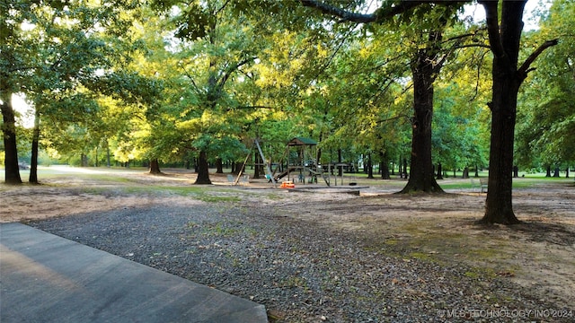 view of home's community with a playground