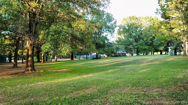 surrounding community with a lawn