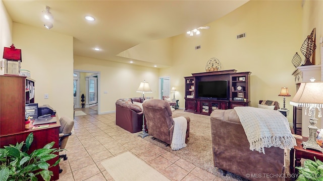 living room with light tile patterned flooring