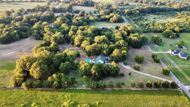 birds eye view of property featuring a rural view