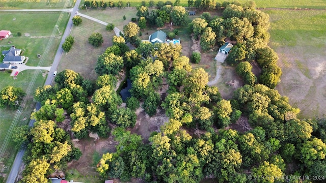 birds eye view of property with a rural view