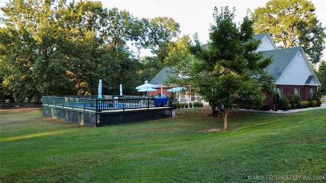 view of yard featuring a deck