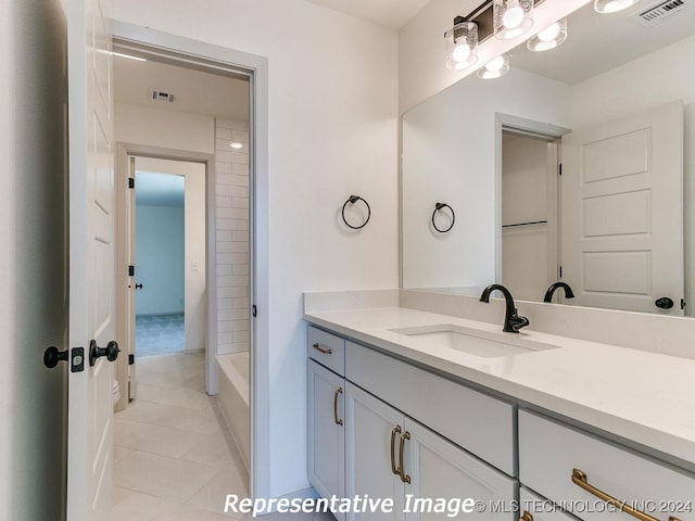 bathroom featuring vanity and tile patterned floors