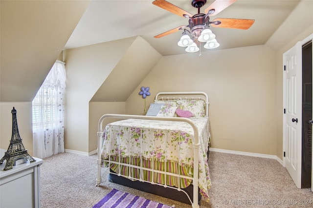 bedroom featuring ceiling fan, lofted ceiling, and light carpet