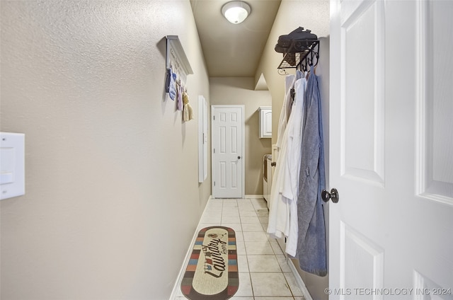 mudroom featuring light tile patterned floors