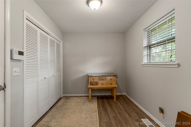 living area featuring dark wood-type flooring