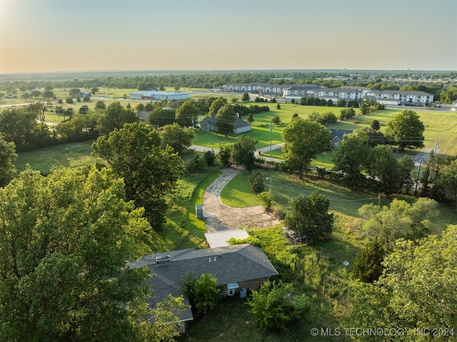 aerial view at dusk with a rural view