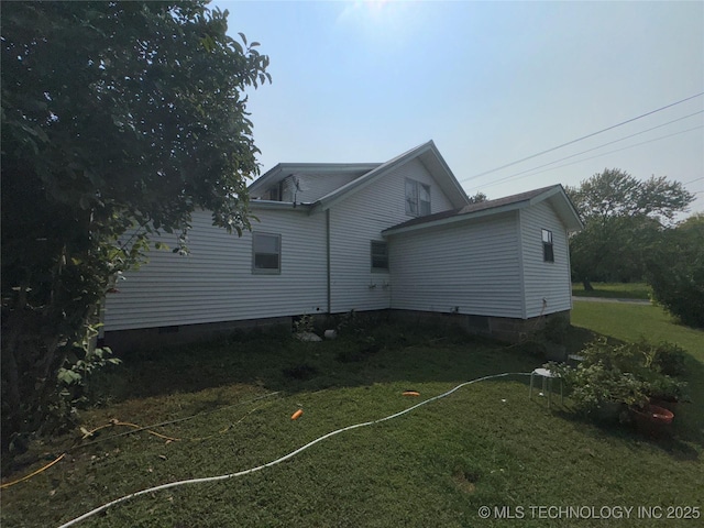 view of property exterior featuring crawl space