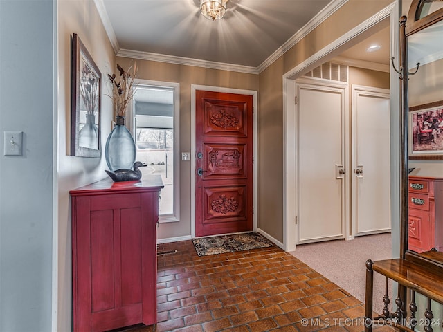 entryway featuring ornamental molding