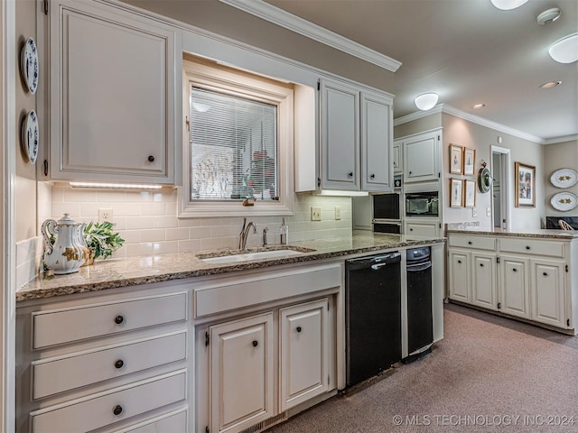 kitchen featuring light stone counters, ornamental molding, a sink, black appliances, and tasteful backsplash