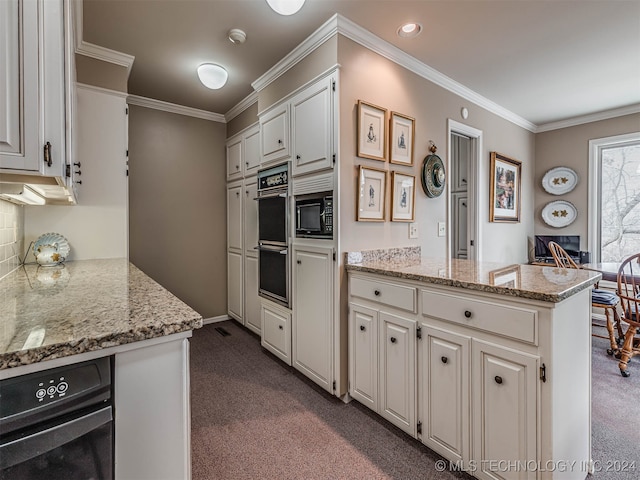 kitchen with ornamental molding, kitchen peninsula, light stone counters, and white cabinetry