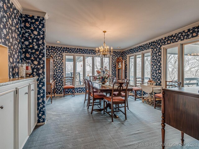 dining area featuring a notable chandelier, crown molding, wallpapered walls, and light colored carpet
