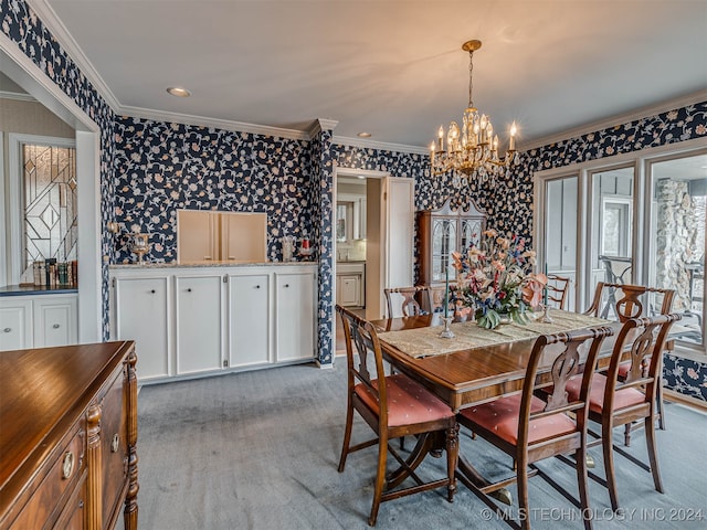 carpeted dining room featuring an inviting chandelier and crown molding