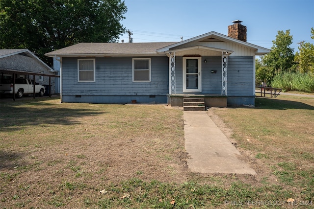 view of front facade featuring a front yard