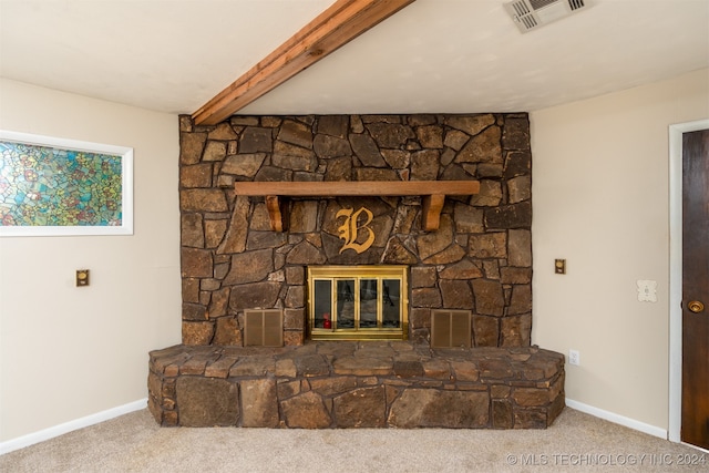 details featuring a stone fireplace, beamed ceiling, and carpet flooring