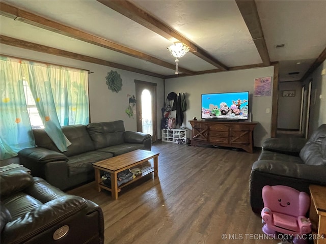 living area with beam ceiling and dark wood-type flooring