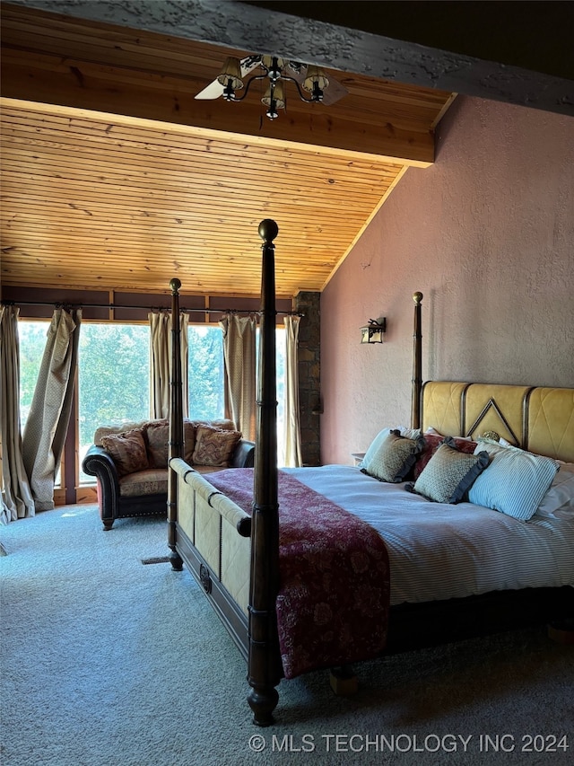 bedroom featuring carpet flooring, beam ceiling, and wooden ceiling