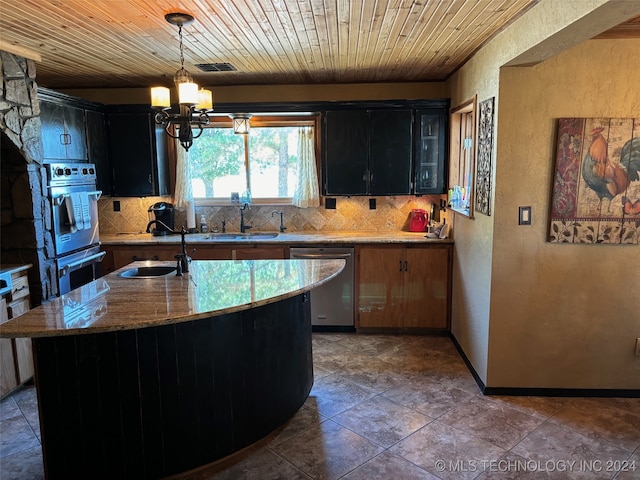 kitchen with dishwasher, light stone counters, backsplash, and sink