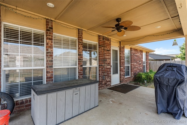 view of patio featuring grilling area and ceiling fan