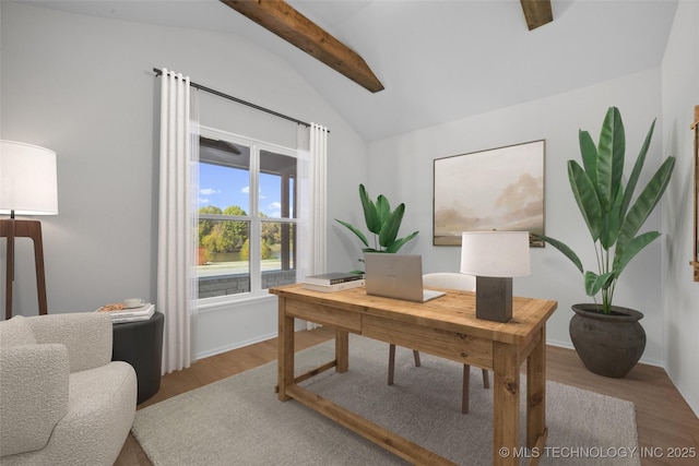 office featuring light hardwood / wood-style flooring and lofted ceiling with beams