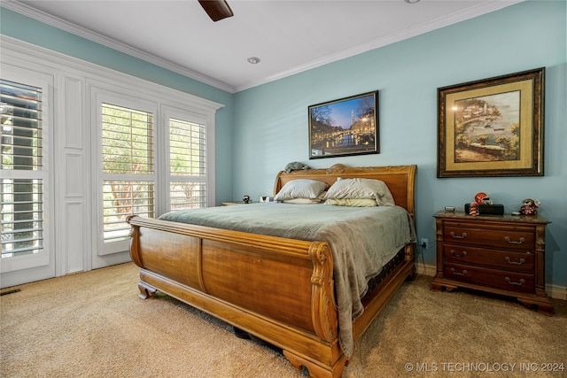 bedroom featuring crown molding, light colored carpet, ceiling fan, and access to exterior