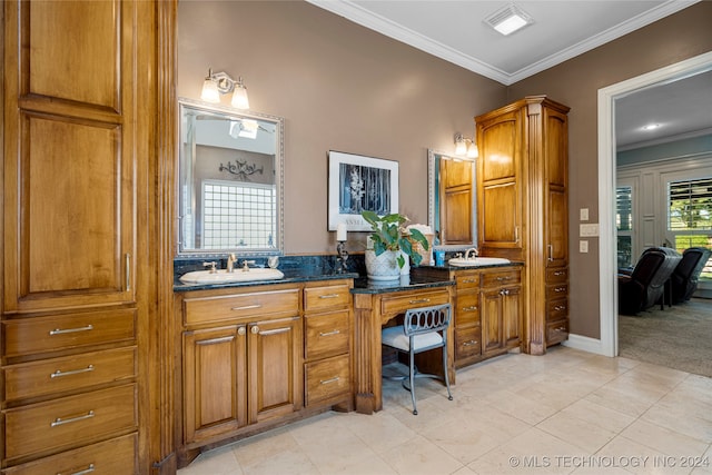 bathroom featuring ornamental molding, vanity, and tile patterned flooring