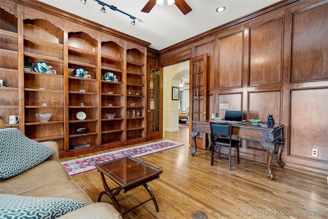 office space featuring light hardwood / wood-style flooring, ceiling fan, and rail lighting